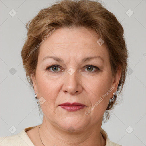 Joyful white adult female with medium  brown hair and grey eyes