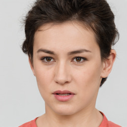 Neutral white young-adult female with short  brown hair and brown eyes