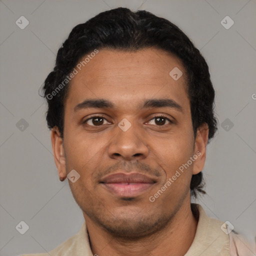 Joyful latino young-adult male with short  black hair and brown eyes