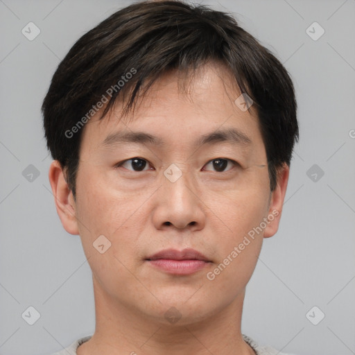 Neutral asian young-adult male with short  brown hair and brown eyes