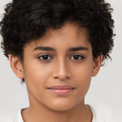 Joyful white child male with short  brown hair and brown eyes