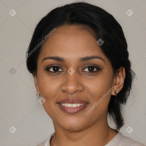 Joyful black young-adult female with medium  brown hair and brown eyes