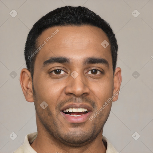 Joyful latino young-adult male with short  black hair and brown eyes