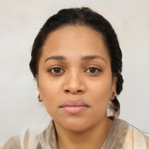 Neutral black young-adult female with medium  brown hair and brown eyes