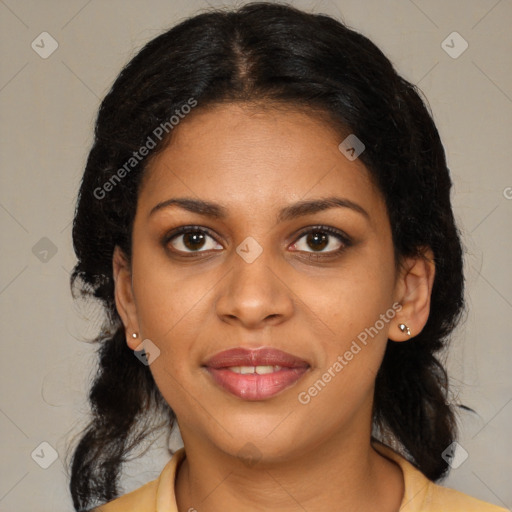 Joyful black young-adult female with medium  brown hair and brown eyes