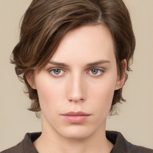 Neutral white young-adult female with medium  brown hair and grey eyes