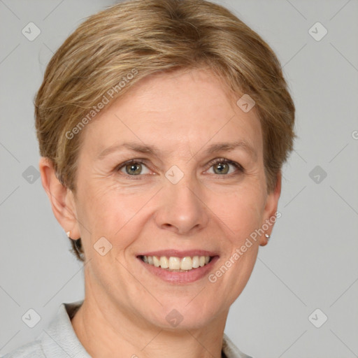 Joyful white adult female with short  brown hair and grey eyes