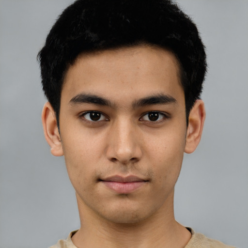 Neutral latino young-adult male with short  black hair and brown eyes