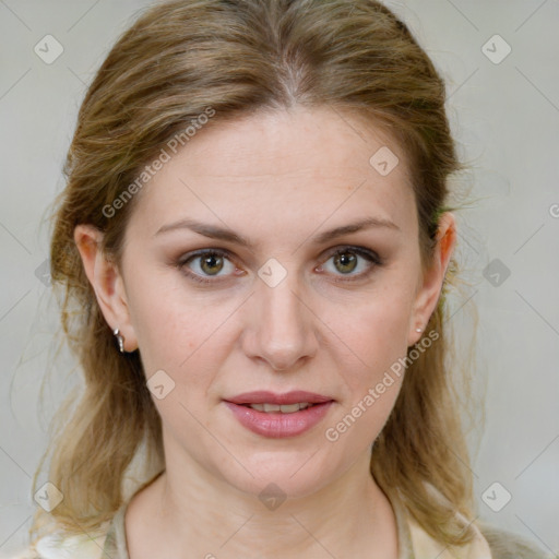 Joyful white young-adult female with medium  brown hair and green eyes