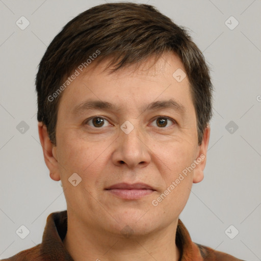 Joyful white adult male with short  brown hair and brown eyes