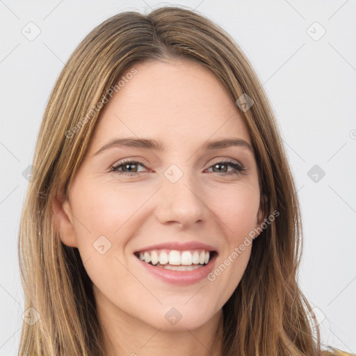 Joyful white young-adult female with long  brown hair and green eyes