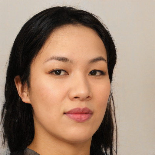 Neutral asian young-adult female with medium  brown hair and brown eyes