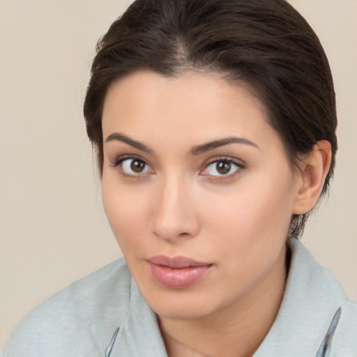 Neutral white young-adult female with medium  brown hair and brown eyes