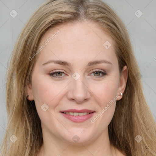 Joyful white young-adult female with long  brown hair and green eyes