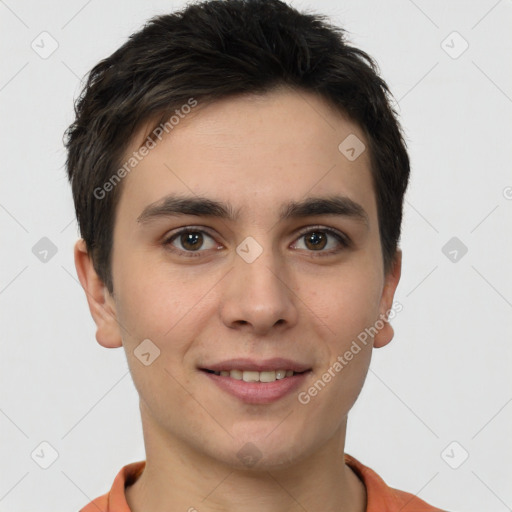 Joyful white young-adult male with short  brown hair and brown eyes