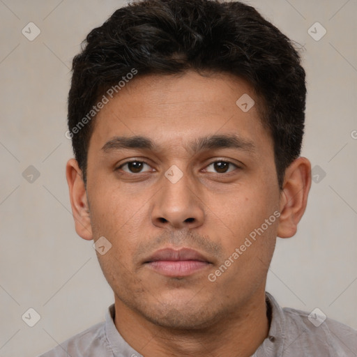 Neutral latino young-adult male with short  brown hair and brown eyes