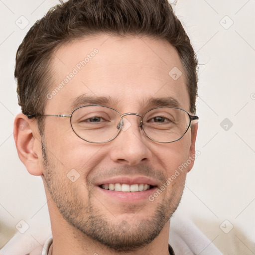 Joyful white adult male with short  brown hair and grey eyes