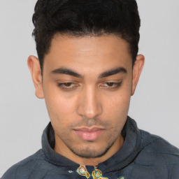 Neutral white young-adult male with short  black hair and brown eyes