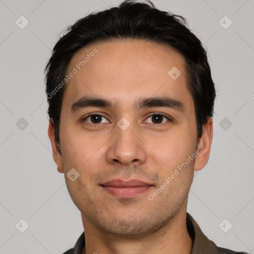 Joyful white young-adult male with short  black hair and brown eyes