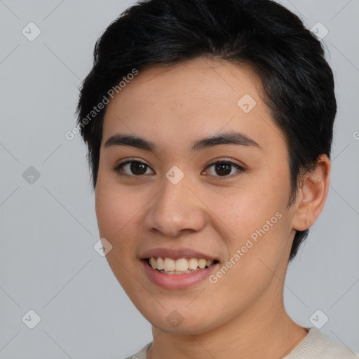 Joyful asian young-adult female with short  brown hair and brown eyes