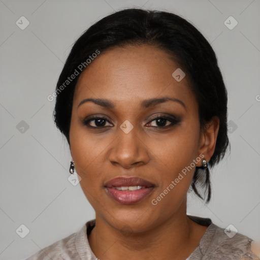 Joyful black young-adult female with medium  black hair and brown eyes