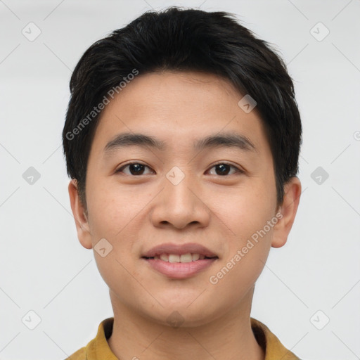 Joyful asian young-adult male with short  black hair and brown eyes