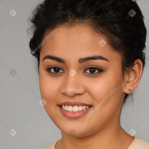 Joyful latino young-adult female with short  brown hair and brown eyes