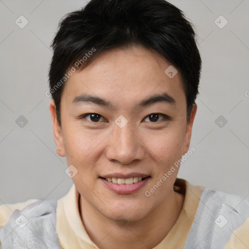 Joyful asian young-adult male with short  brown hair and brown eyes