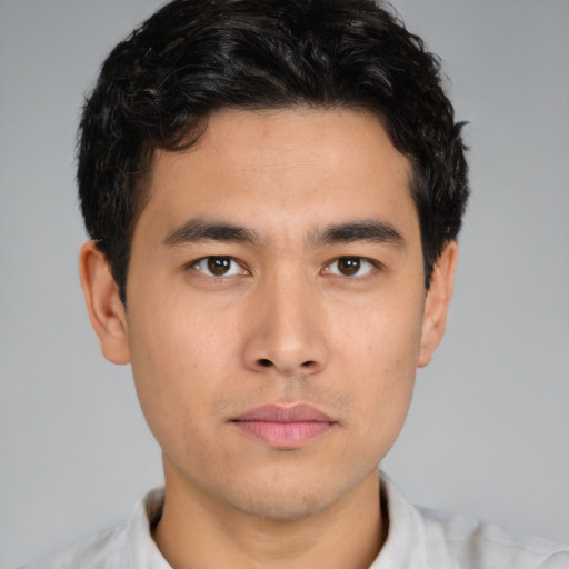 Neutral asian young-adult male with short  brown hair and brown eyes