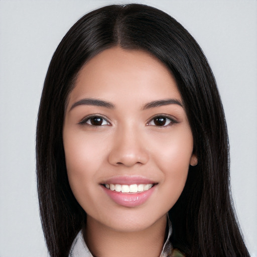 Joyful white young-adult female with long  black hair and brown eyes