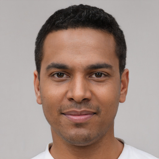 Neutral black young-adult male with short  black hair and brown eyes