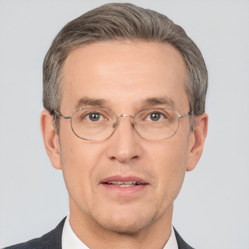 Neutral white middle-aged male with short  brown hair and brown eyes