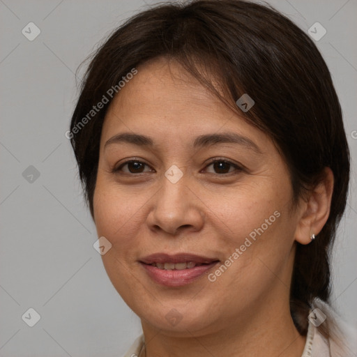 Joyful white adult female with medium  brown hair and brown eyes