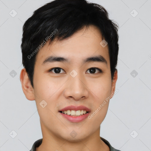 Joyful asian young-adult male with short  black hair and brown eyes