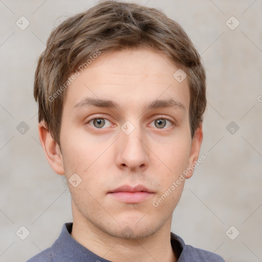 Neutral white young-adult male with short  brown hair and grey eyes