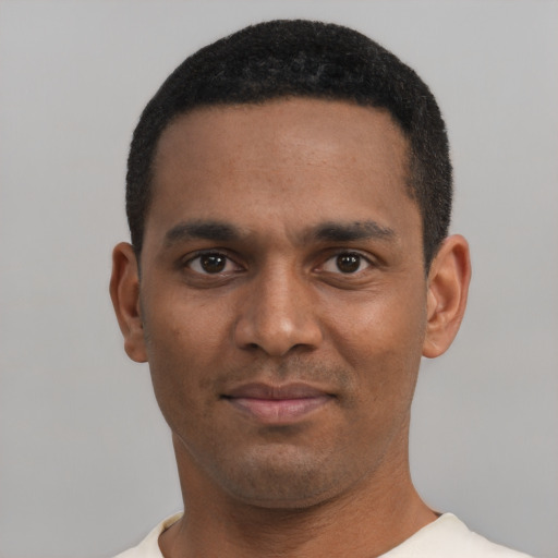Neutral black young-adult male with short  black hair and brown eyes