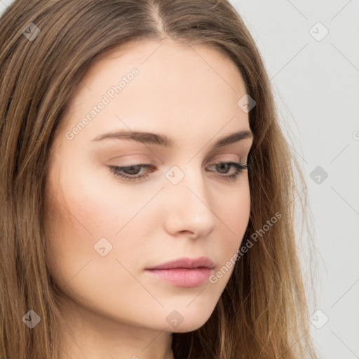 Neutral white young-adult female with long  brown hair and brown eyes