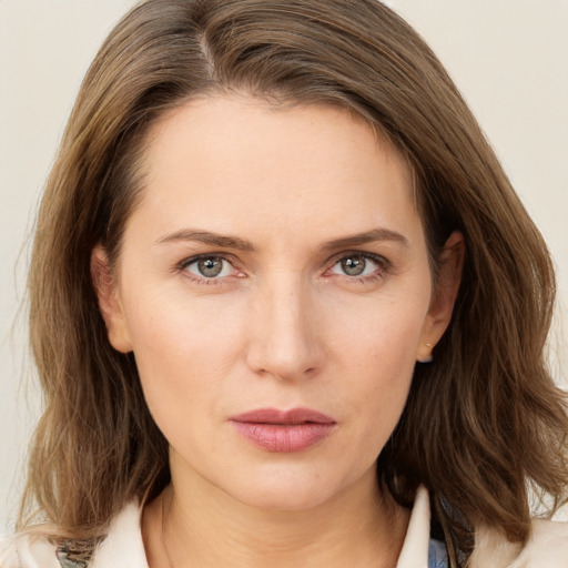 Neutral white young-adult female with medium  brown hair and green eyes