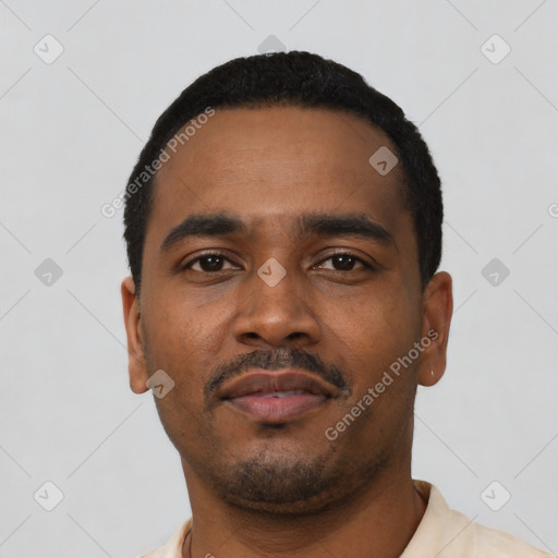 Neutral latino young-adult male with short  black hair and brown eyes