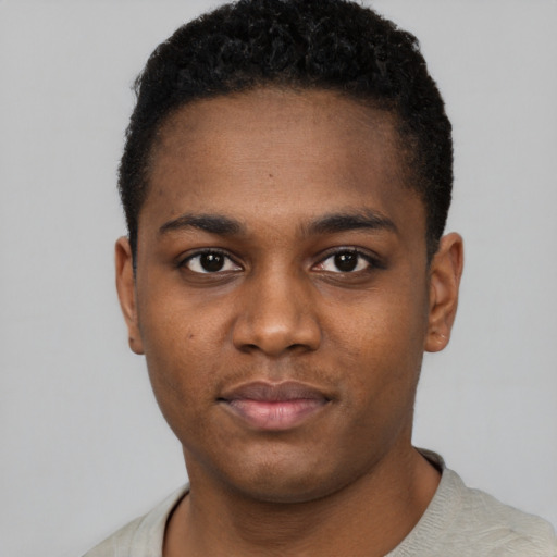 Neutral black young-adult male with short  black hair and brown eyes