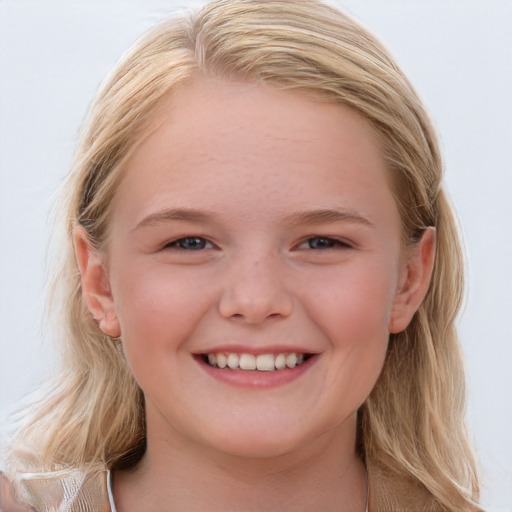 Joyful white child female with long  brown hair and blue eyes