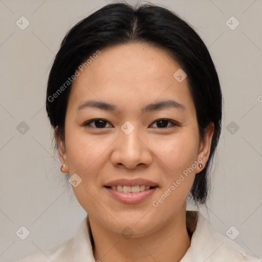 Joyful asian young-adult female with medium  black hair and brown eyes