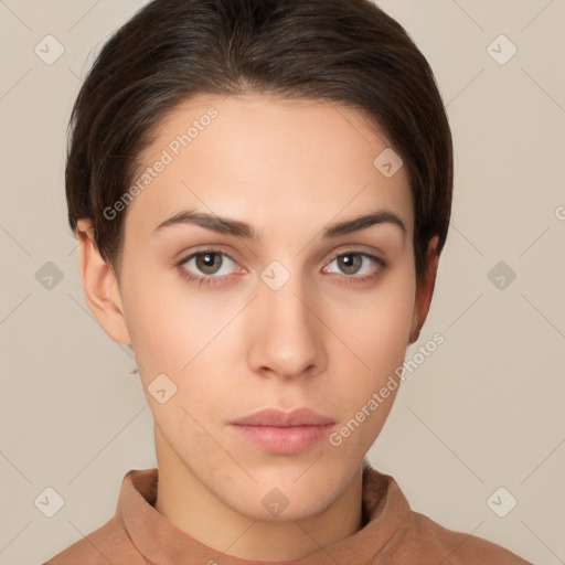 Neutral white young-adult female with short  brown hair and brown eyes