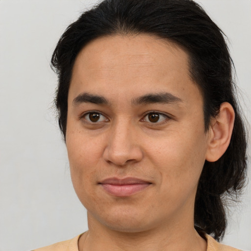 Joyful white young-adult male with medium  brown hair and brown eyes