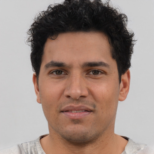 Neutral latino young-adult male with short  brown hair and brown eyes