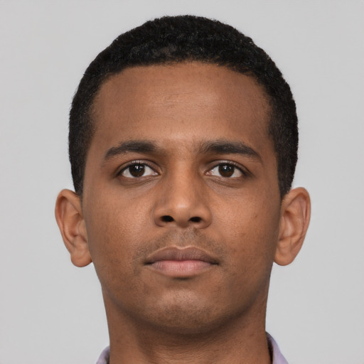 Neutral latino young-adult male with short  brown hair and brown eyes