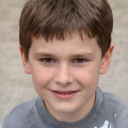 Joyful white child male with short  brown hair and brown eyes