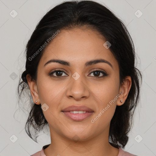 Joyful latino young-adult female with medium  brown hair and brown eyes