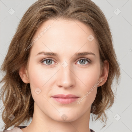 Joyful white young-adult female with medium  brown hair and blue eyes