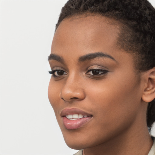 Joyful latino young-adult female with short  brown hair and brown eyes